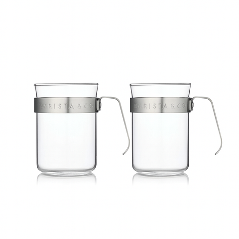 Twee koffieglazen van Barista & Co van borosilicaatglas en RVS handvat
